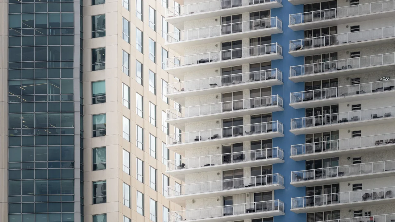 Close-up view of modern high-rise building facades in Miami, Florida, showcasing urban architecture.